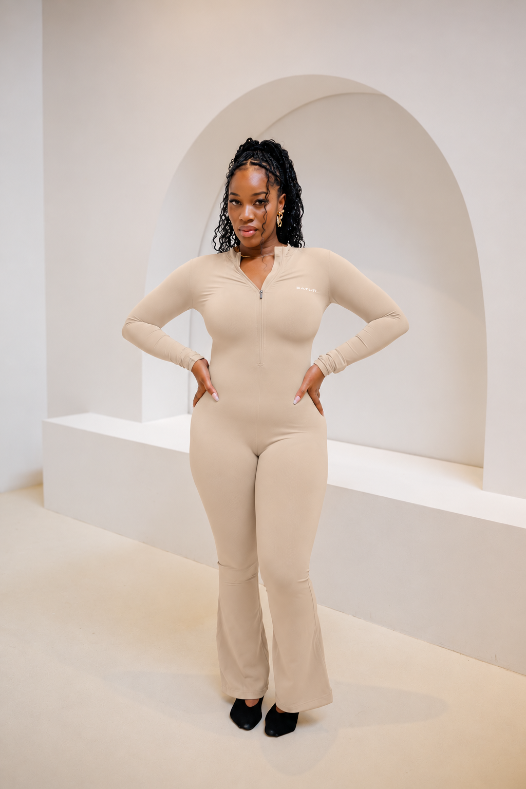 Contour Flare Jumpsuit in nude beige